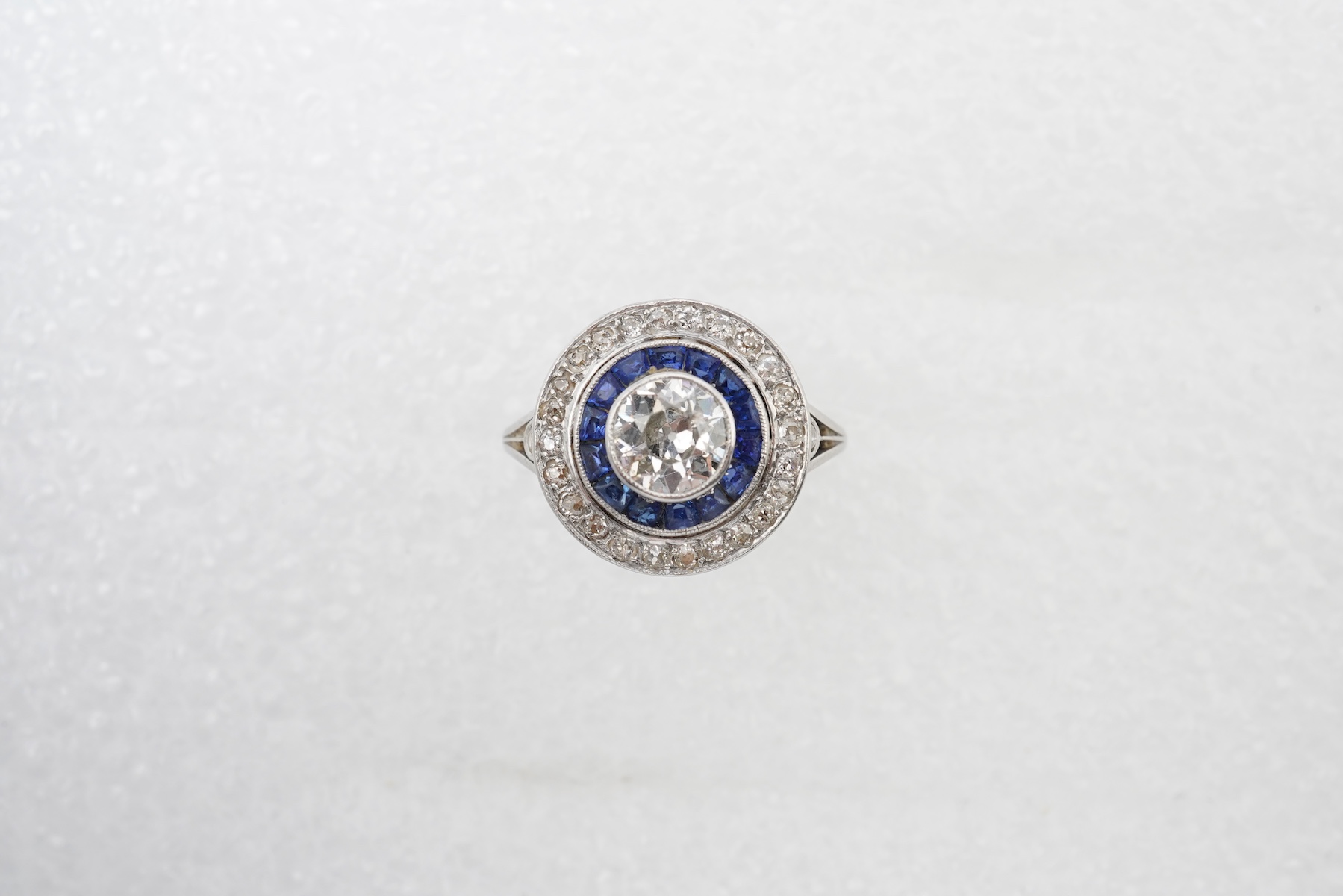 A diamond and sapphire 'target' ring